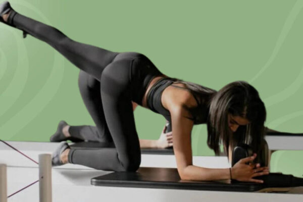 Swivel, stretch, repeat! Employees are turning their everyday chairs into full-on Pilates equipment