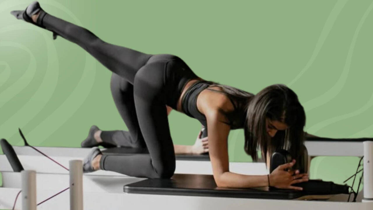 Swivel, stretch, repeat! Employees are turning their everyday chairs into full-on Pilates equipment