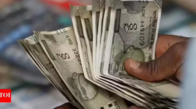 Rupee gains as oil slips but volatility remains high