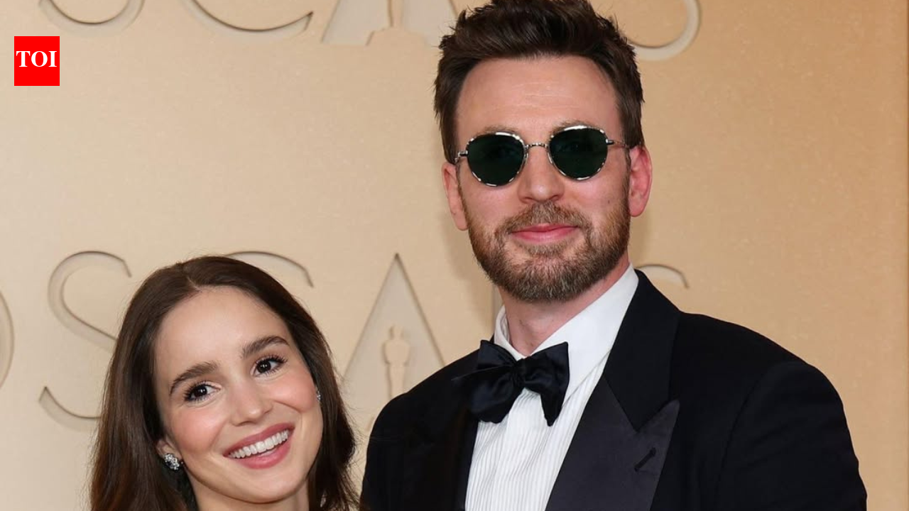 Chris Evans and Alba Baptista charm fans with a rare red carpet appearance at the 2026 Oscars after welcoming their daughter | English Movie News