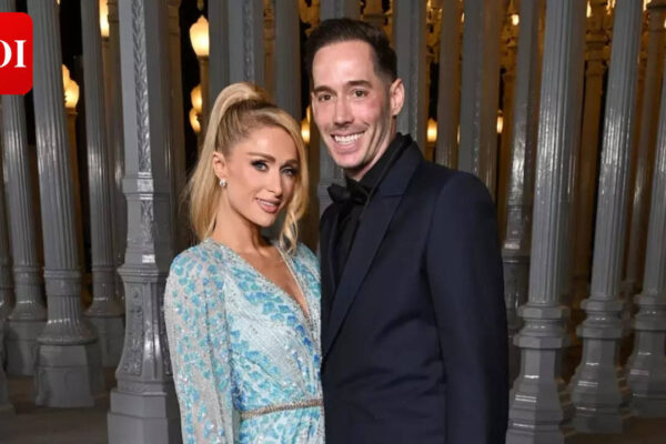 Paris Hilton’s husband, Carter Reum, says ‘she loves me to death,’ squashing the ongoing rumors about their marriage |