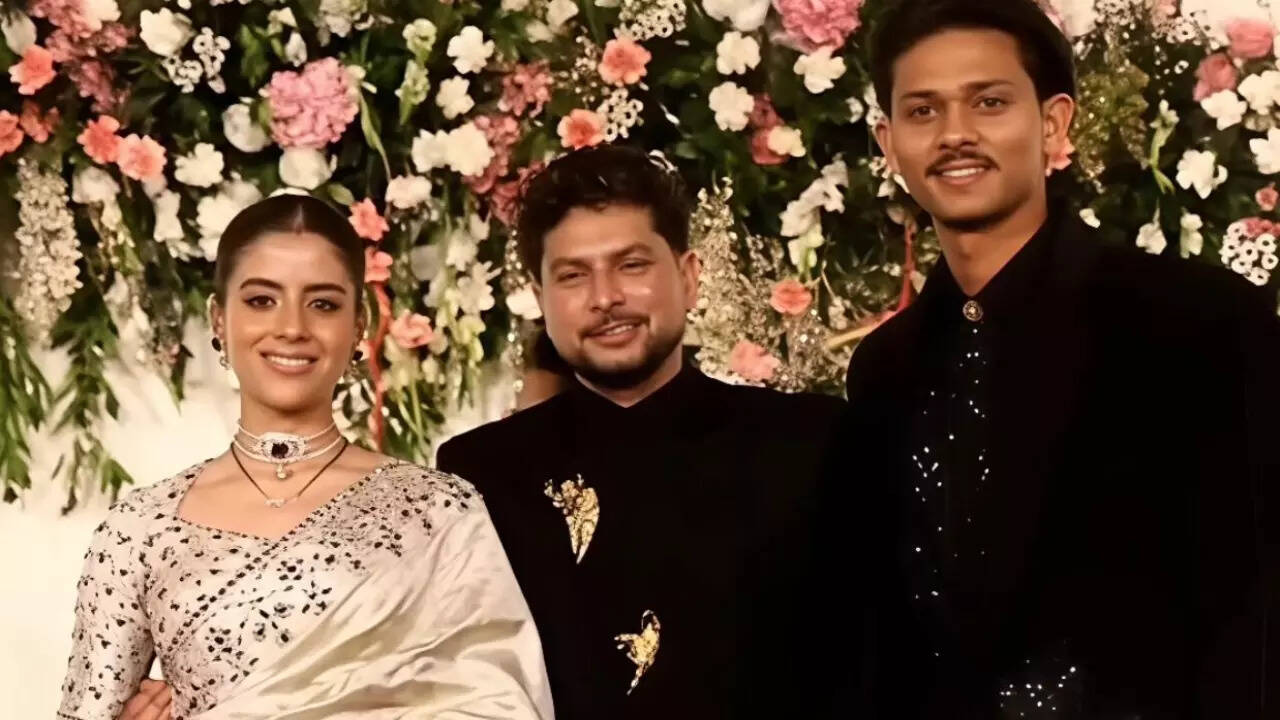 Vanshika Chadha stuns in off-white saree at Reception, Kuldeep Yadav looks dashing in black |
