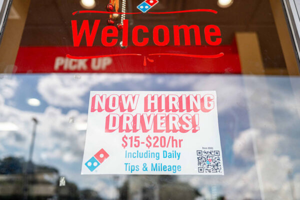 Stocks making the biggest moves premarket: QCOM, DPZ, ADBE