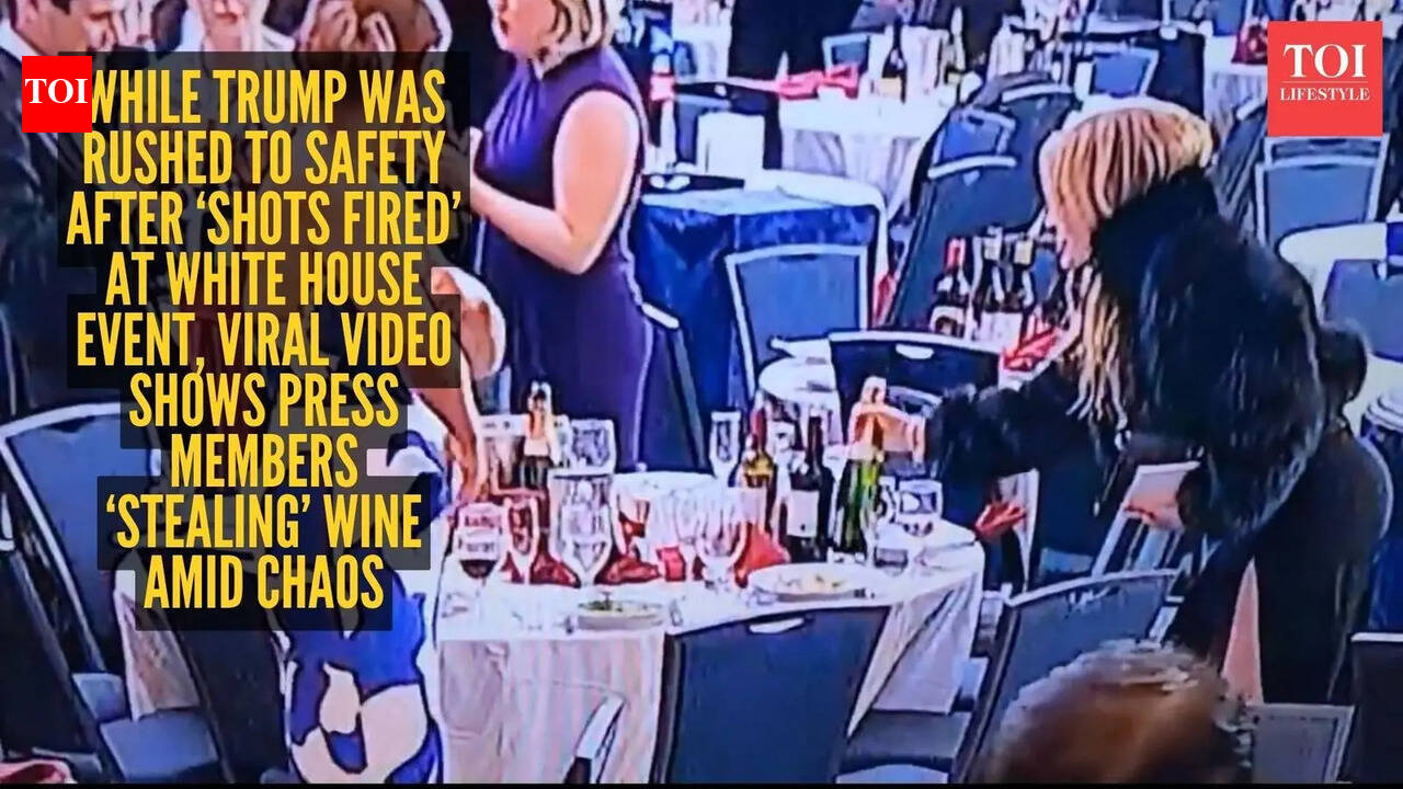 While Trump was rushed to safety after ‘shots fired’ at White House event, viral video shows press members ‘stealing’ wine amid chaos