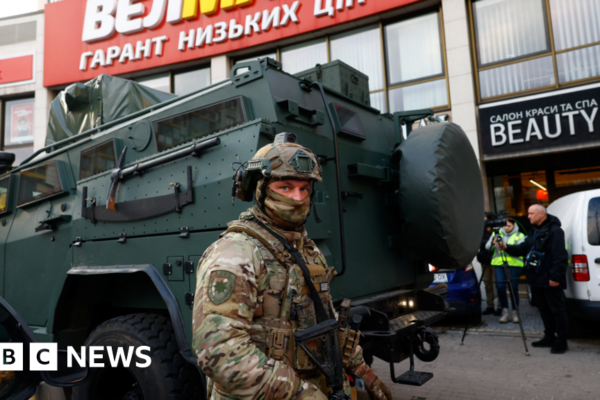 At least six killed in Kyiv as gunman opens fire and takes hostages