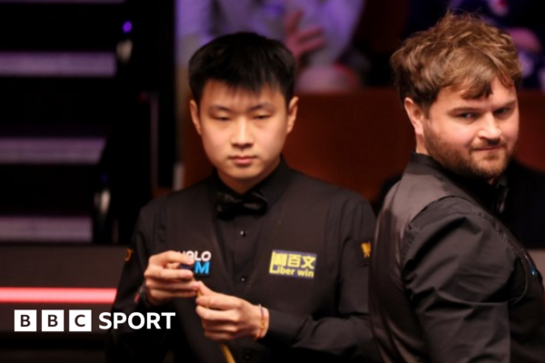 World Snooker Championship: Zhao Xintong beats Liam Highfield in first round at Crucible