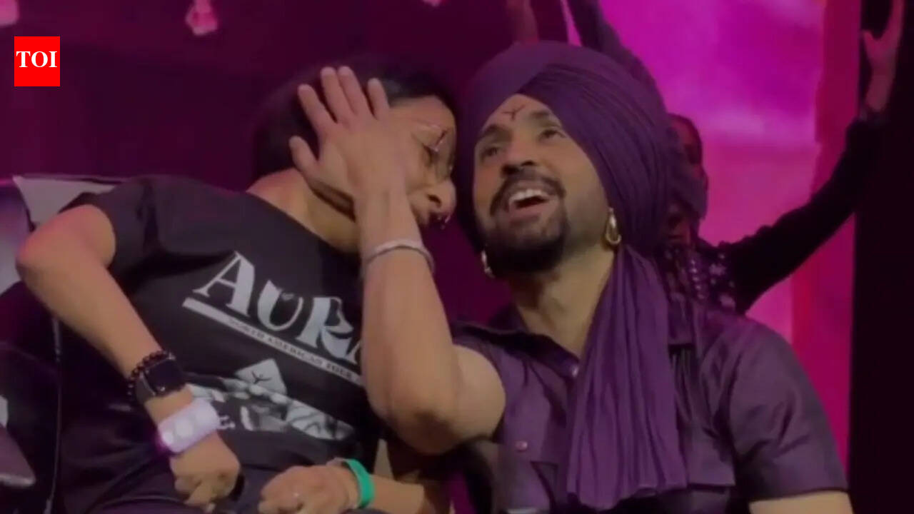 Diljit Dosanjh's heartwarming moment with a fan wins the internet as he sings 'Hass Hass' live for her - Watch | Hindi Movie News
