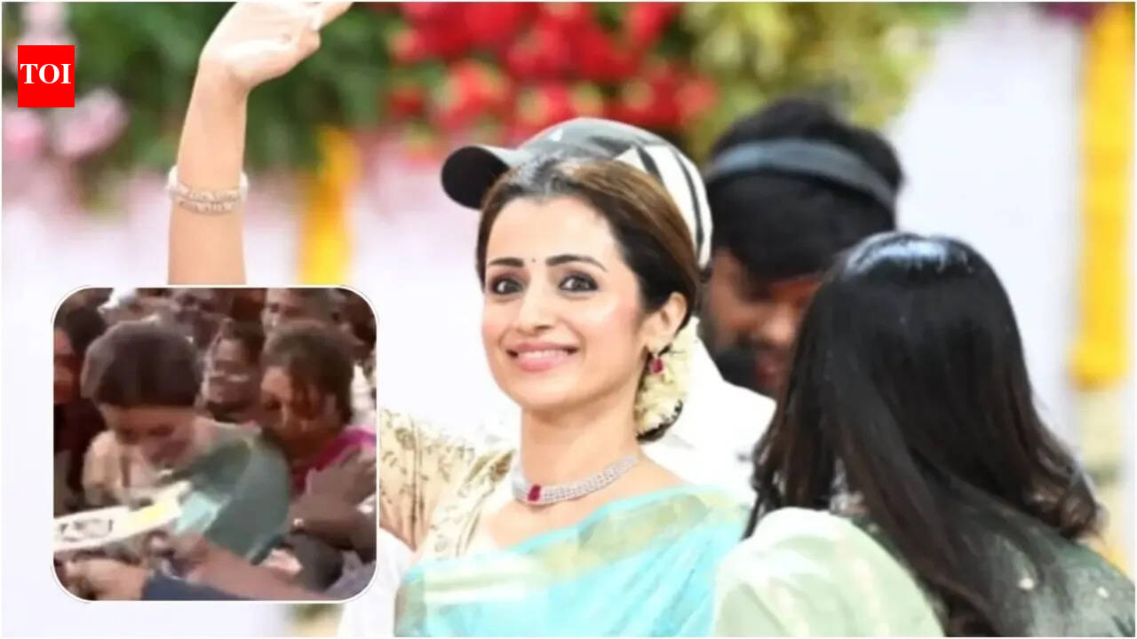 Vijay: Trisha Krishnan gets mobbed while leaving Vijay's Tamil Nadu CM oath ceremony; handles the post-event frenzy with grace | Tamil Movie News