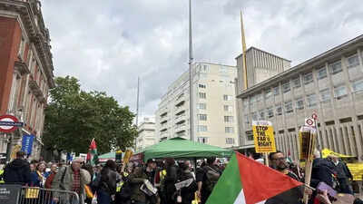 Man held after van injures pedestrian during protests over removal of flags in Birmingham