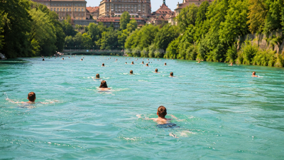 Switzerland’s summer hack: People swim through a river to get home from work | World News