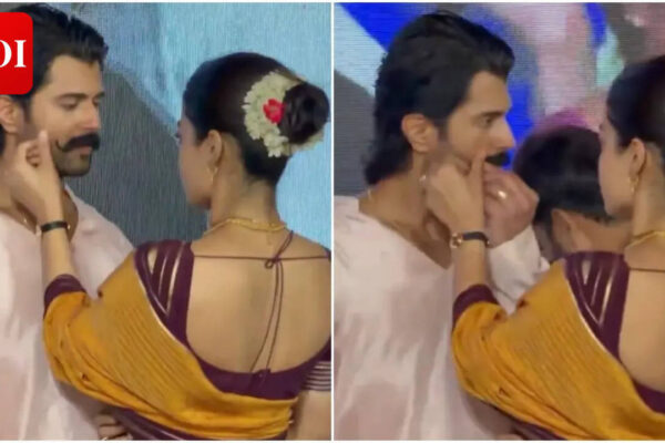 Rashmika Mandanna twirls Vijay Deverakonda's moustache; Couple's sweet moment wins hearts - WATCH | Telugu Movie News