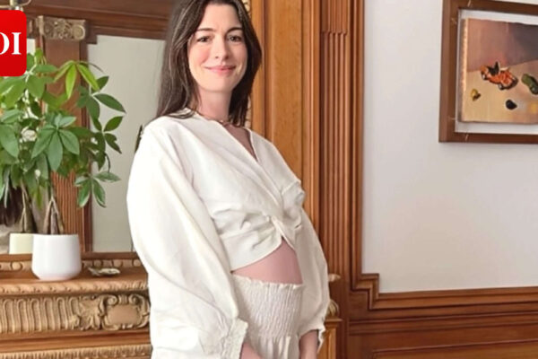Anne Hathaway focuses on family, says 'We're all just in it' as she awaits baby No. 3 |