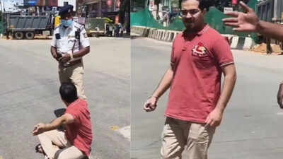 Man sits on road as pregnant wife 'trapped' in traffic jam after VIP convoy stops vehicles in Bengaluru | Bengaluru News