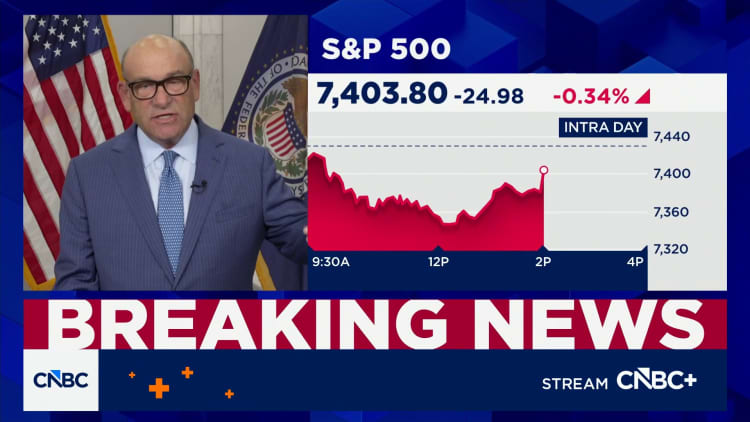 Divided Fed holds interest rates steady