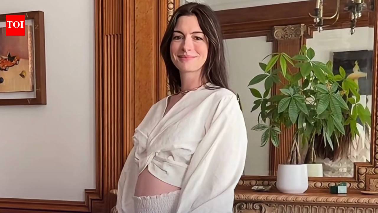Anne Hathaway says she was 'shocked' to learn she was pregnant with baby No. 3: 'We're calling this one our buzzer-beater' |