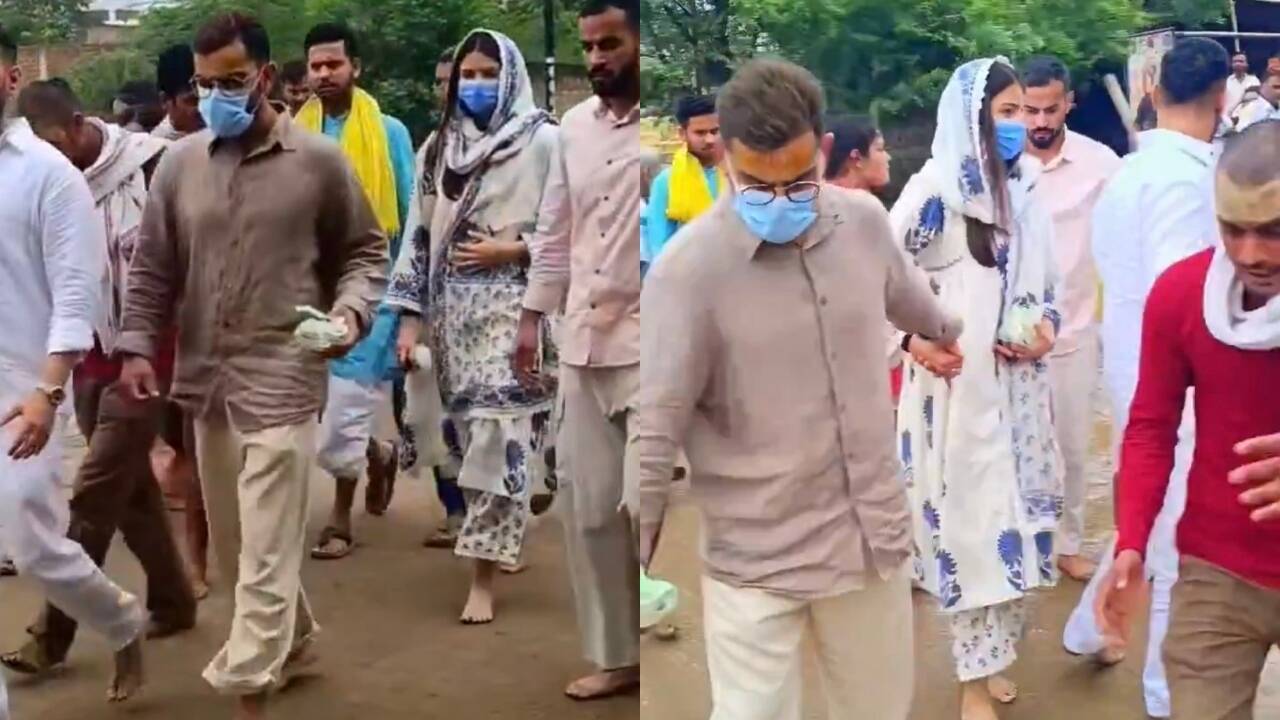 Virat Kohli, Anushka Sharma spotted barefoot in Vrindavan after visiting Premanand Ji Maharaj on Wednesday, videos go viral on the internet - WATCH |
