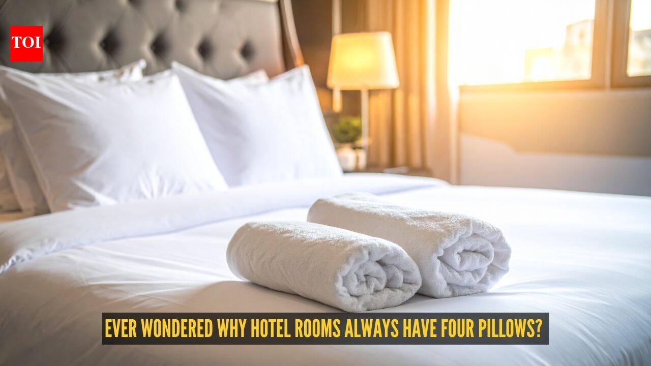 Ever wondered why hotel rooms always have four pillows? Here's the real reason