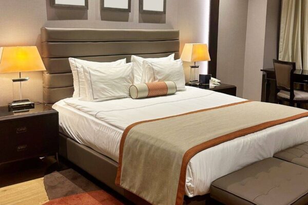 Why that colourful cloth on hotel beds is more useful than you think