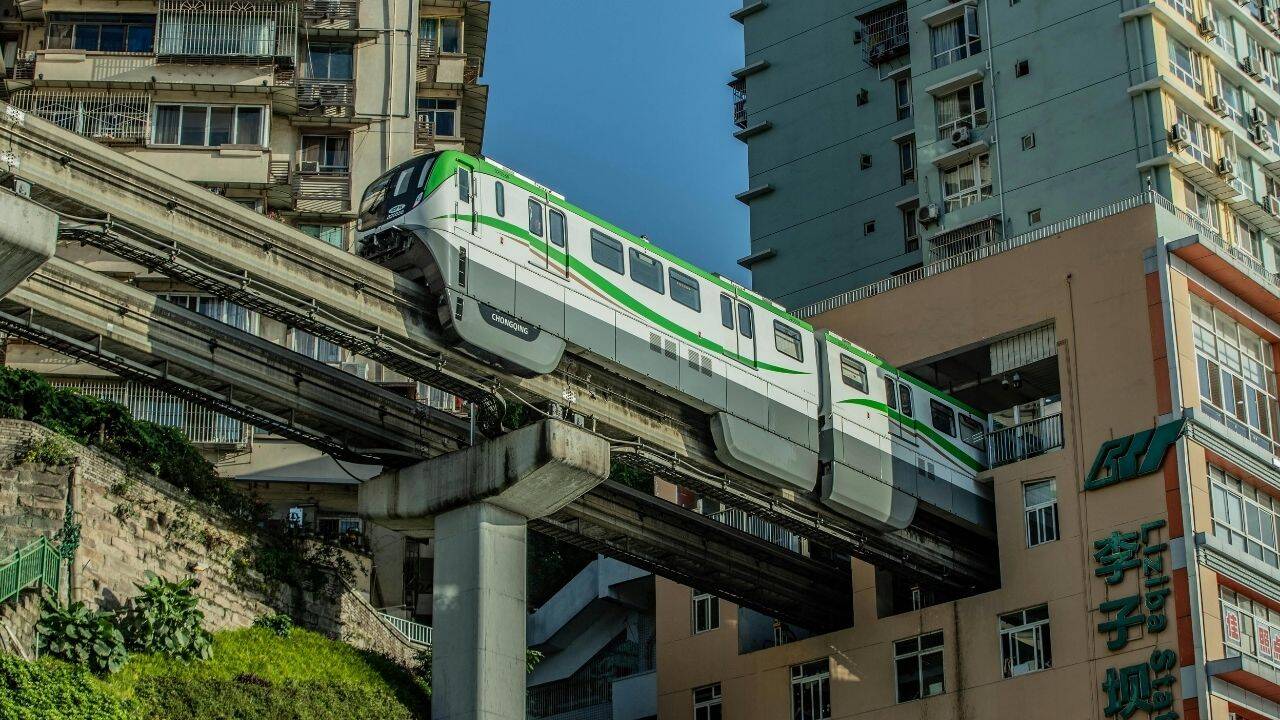 There’s a train in China that runs through a residential building apartment and it is one of the world's most incredible travel experiences |