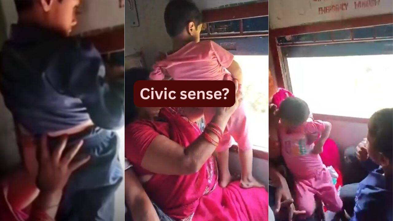 Mother holds child out of moving train window to urinate; video sparks debate on civic sense and child safety during travel |