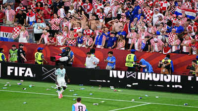 Watch: Croatia fans throw bottles onto the pitch after VAR drama denies last-minute equaliser vs Portugal | Football News