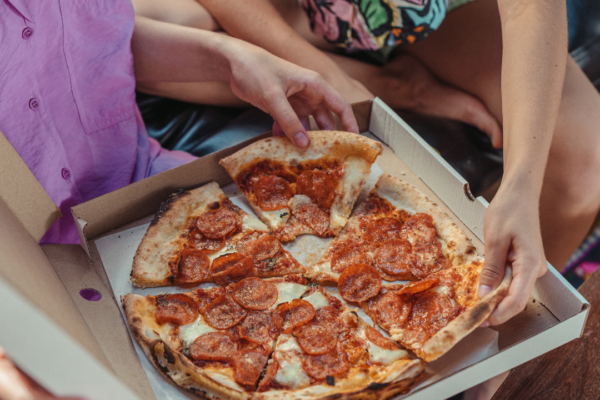Why pizza boxes are square but pizzas are round?
