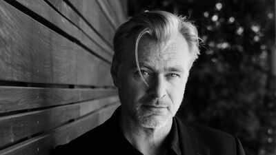 Quote of the day by Christopher Nolan: "I am a fan of cinema that creates worlds, that creates an entire alternate universe that you could escape into for a couple of hours." | India News