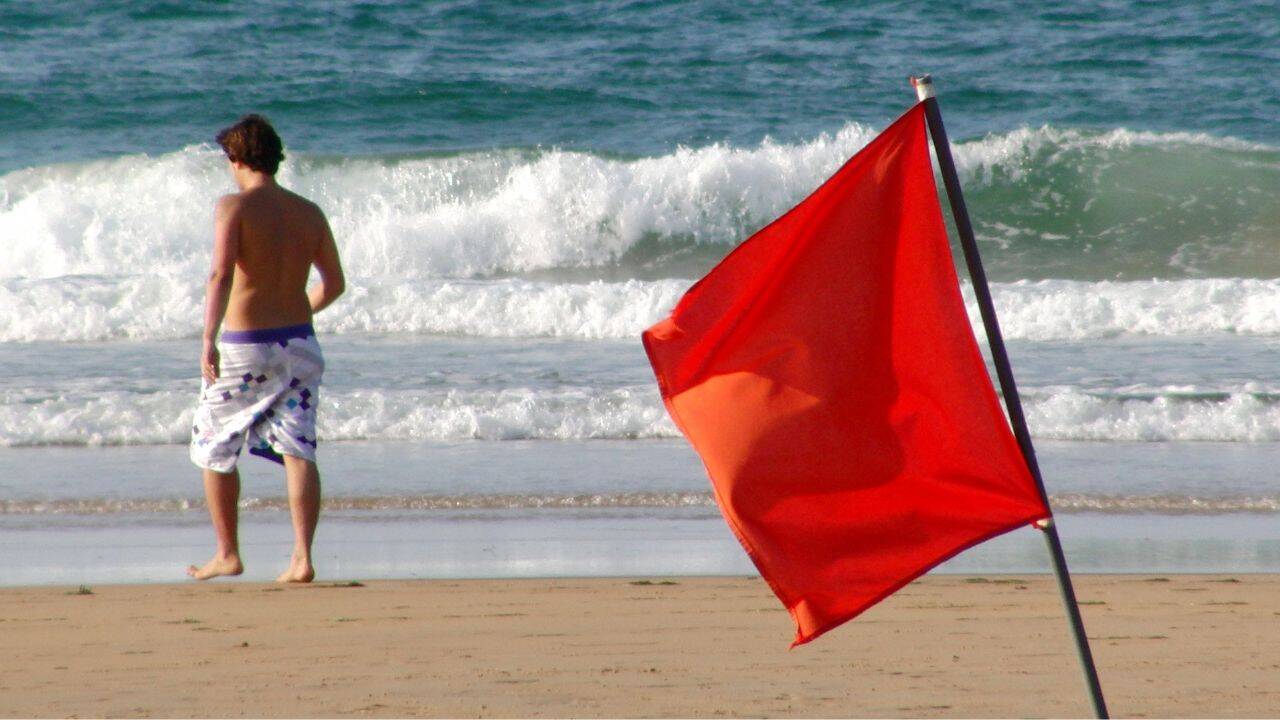 Beach Flag Rules: What do red, yellow, purple, green, and double flags mean at the beach? Why every traveller should be aware of these beach rules |