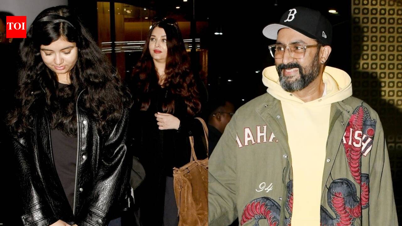 Abhishek Bachchan, Aishwarya Rai Bachchan return from holiday, Aaradhya Bachchan's 'namaste' to the paps wins the internet as she twins in black with her mother - WATCH VIDEO |