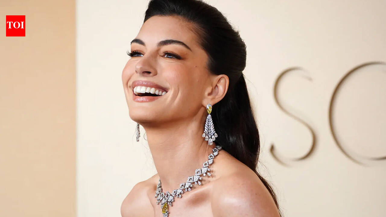 Pregnant Anne Hathaway reveals plans to keep baby’s gender hidden: 'We know, but we're not saying' |