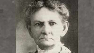 In 1908, an unschooled Indiana widow began a 20-year fight to defend 120 acres of Lake Michigan dunes from a steel giant; 72 years later, 212 acres including part of her tract joined Indiana Dunes to remain open space forever
