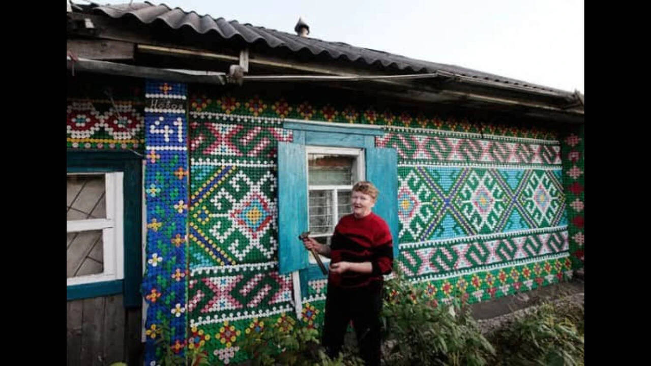 A Russian pensioner covered her Siberian home with 30,000 colourful bottle caps; the unusual recycling project turned a wooden house into a giant work of art