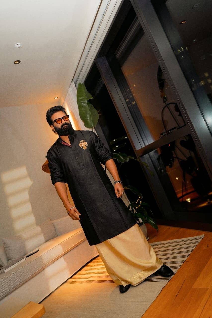 Rishab Shetty makes a cultural statement at IFFM 2026 Red Carpet in traditional black kurta and handwoven silk dhoti |