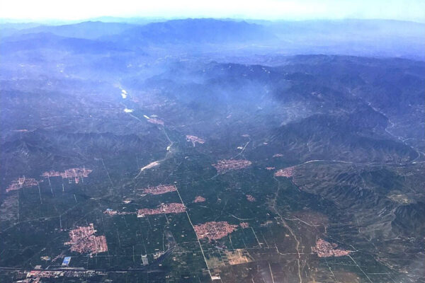 NASA images show more than 820 square kilometres of farmland transformed by the world’s largest cluster of plastic greenhouses