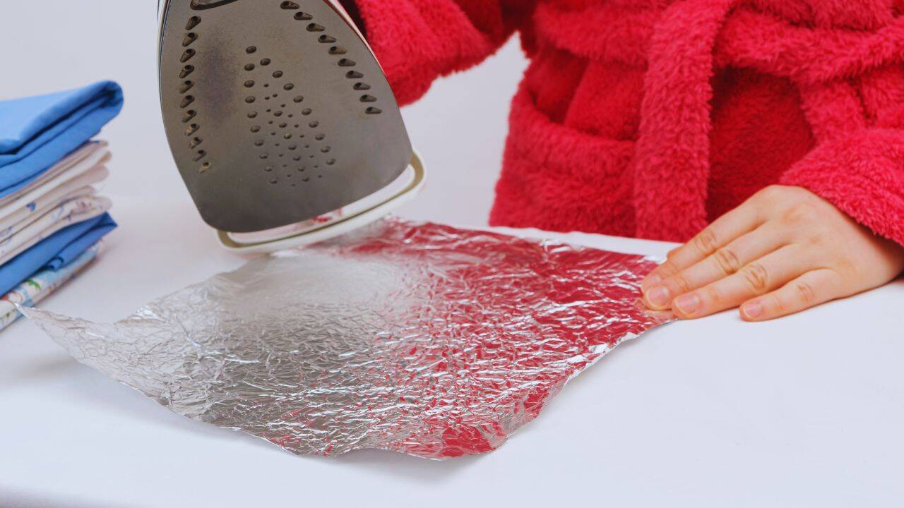 Why some people put aluminium foil under their ironing board and how this simple layer can speed up ironing