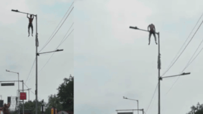 'Want to meet Suvendu-babu': Bengal man climbs lamp post, performs pull-ups, stunts for 40 minutes | Kolkata News
