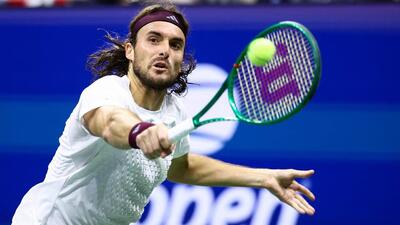 A tennis glory shot - one-handed backhand – ends a 149-year tradition
