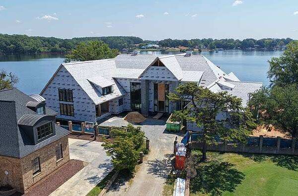 Michael Jordan bought $2.8 million Lake Norman property in 2013, demolished old six-bedroom, eight-bathroom mansion in 2025; new estate now takes shape in aerial pictures