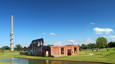 In 2013, an Ohio conservancy bought a 75-acre former glass-factory site; two years later, it reopened as part of a 250-acre park with quarry lakes and a 286-foot smokestack observation tower