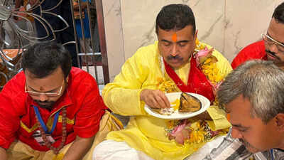 Suvendu Adhikari eats fish bhog at Kalighat amid Bageshwar Baba row: What sparked the controversy | India News
